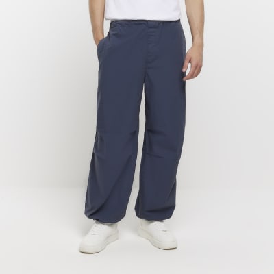 Navy regular fit parachute trousers River Island