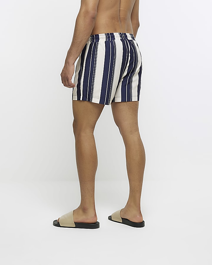 Navy regular fit striped swim shorts