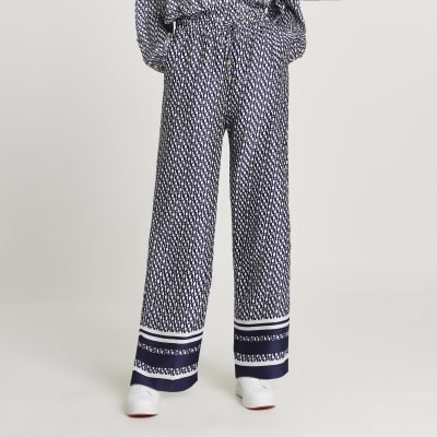 Navy RI monogram jogger wide leg trousers