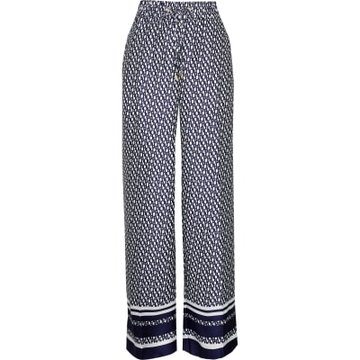 Navy RI monogram jogger wide leg trousers