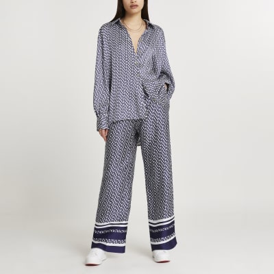 Navy RI monogram jogger wide leg trousers