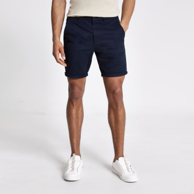 Navy Sid skinny chino shorts | River Island