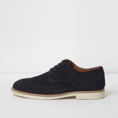 Navy suede white sole brogues