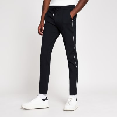 Navy super skinny smart joggers | River Island