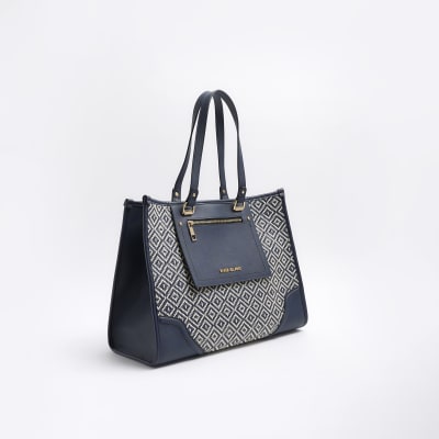 River island navy online handbags