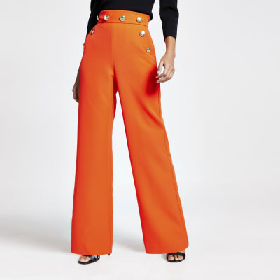 orange flare trousers