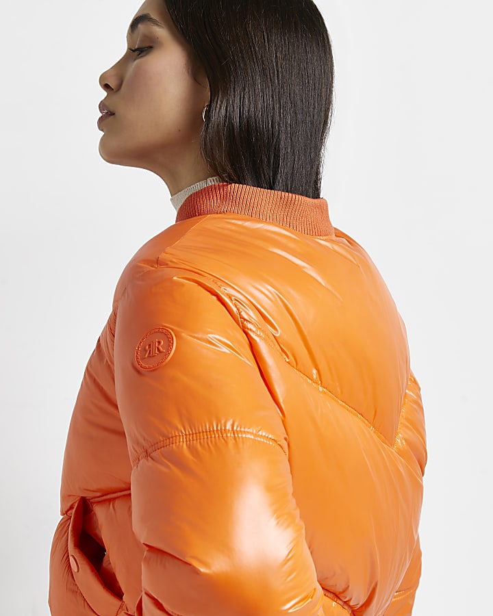 Orange cropped puffer coat