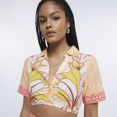 Orange floral cropped shirt River Island
