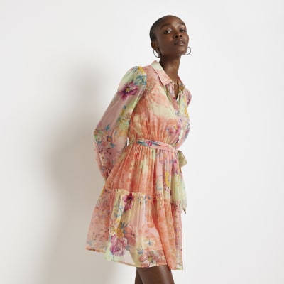 https://images.riverisland.com/is/image/RiverIsland/orange-floral-long-sleeve-mini-shirt-dress_763592_main?$ProductListingPortrait$