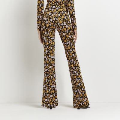 orange flare trousers
