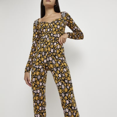orange flare trousers
