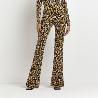 orange flare trousers