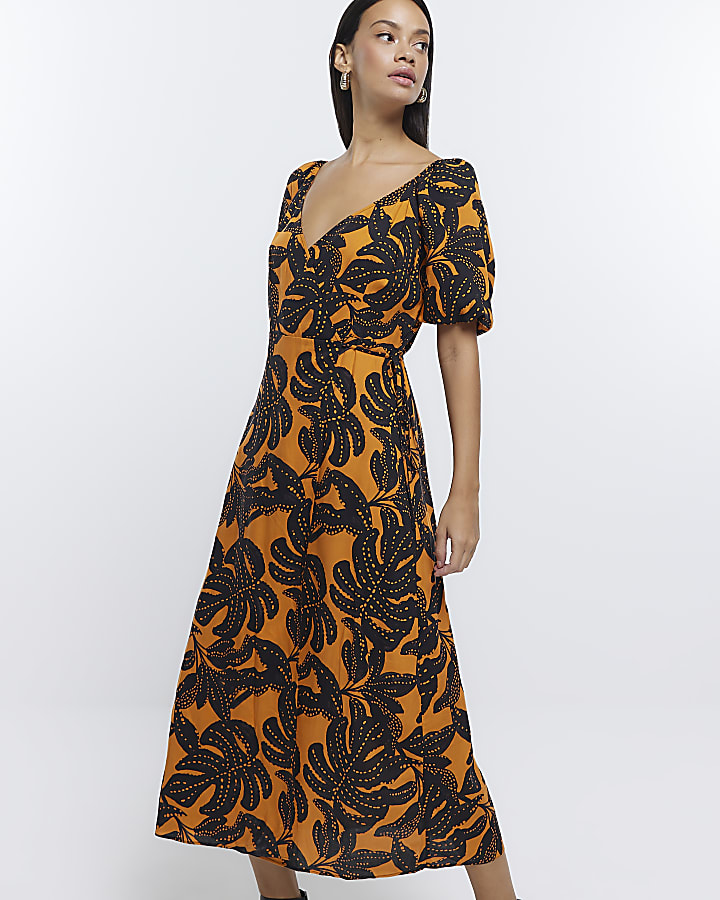 Orange leaf print wrap midi dress