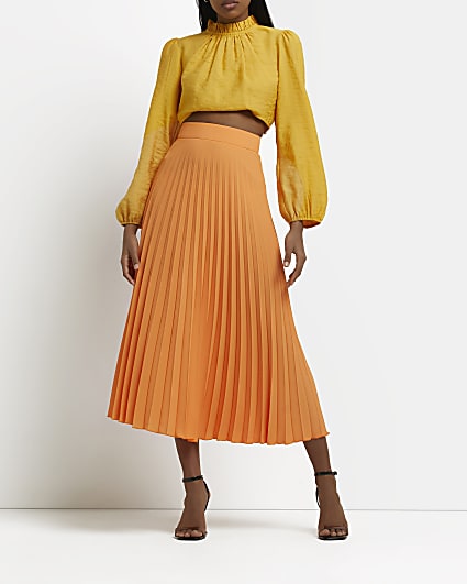 Orange pleated midi skirt