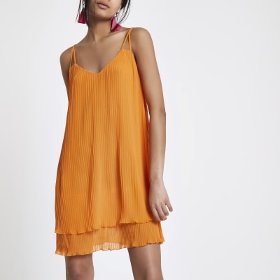 Orange pleated strappy slip dress