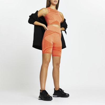 orange ribbed biker shorts