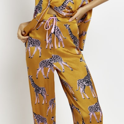 orange satin trousers