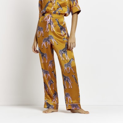 orange satin trousers
