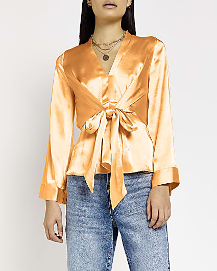 Orange satin tie front long sleeves blouse
