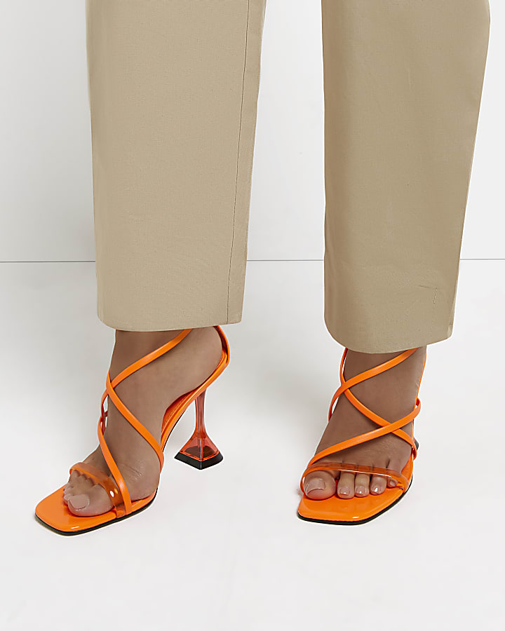 Orange strappy perspex heels
