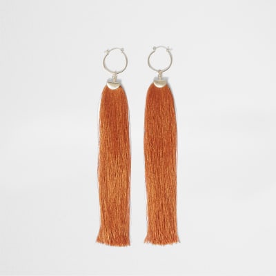 Orange tassel drop hoop earrings