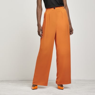 Orange wide leg trousers | River Island