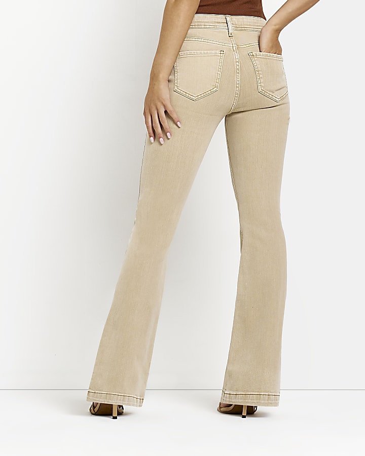 Petite beige mid rise flared jeans