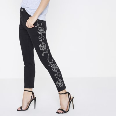 Petite black Alannah floral stud skinny jeans