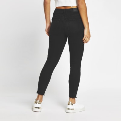 Petite black Amelie super skinny jeans
