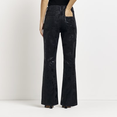 Petite black coated high waisted flared jeans