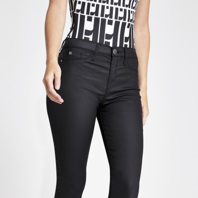 Petite black coated Molly mid rise jeggings