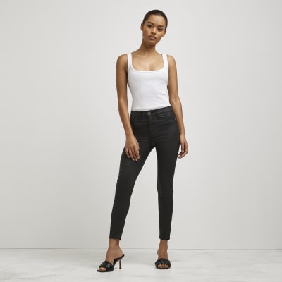 Petite black coated Molly skinny jeans | River Island