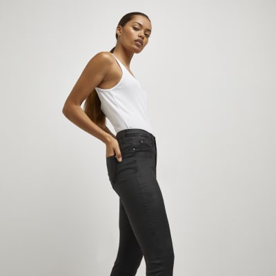 Petite black coated Molly skinny jeans