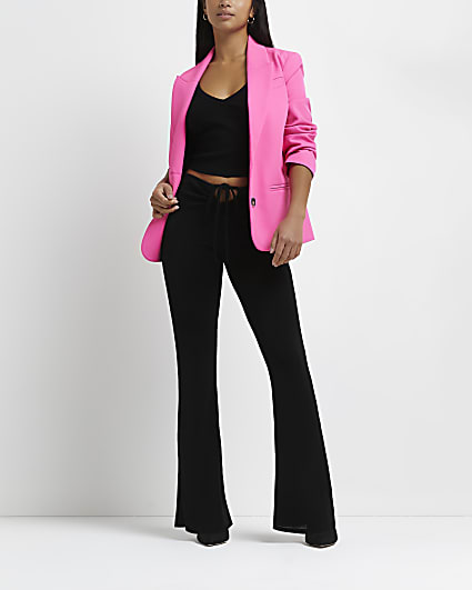 Petite black cut out flared trousers