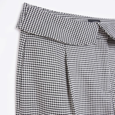 Petite black dogtooth cigarette trousers