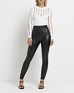 Petite black faux leather skinny trousers