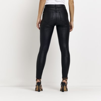 Petite black Molly coated skinny jeans | River Island