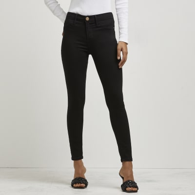 Petite black Molly mid rise skinny jeans River Island
