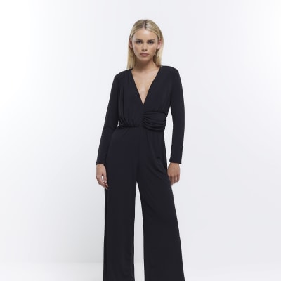 Petite black plunge long sleeve jumpsuit