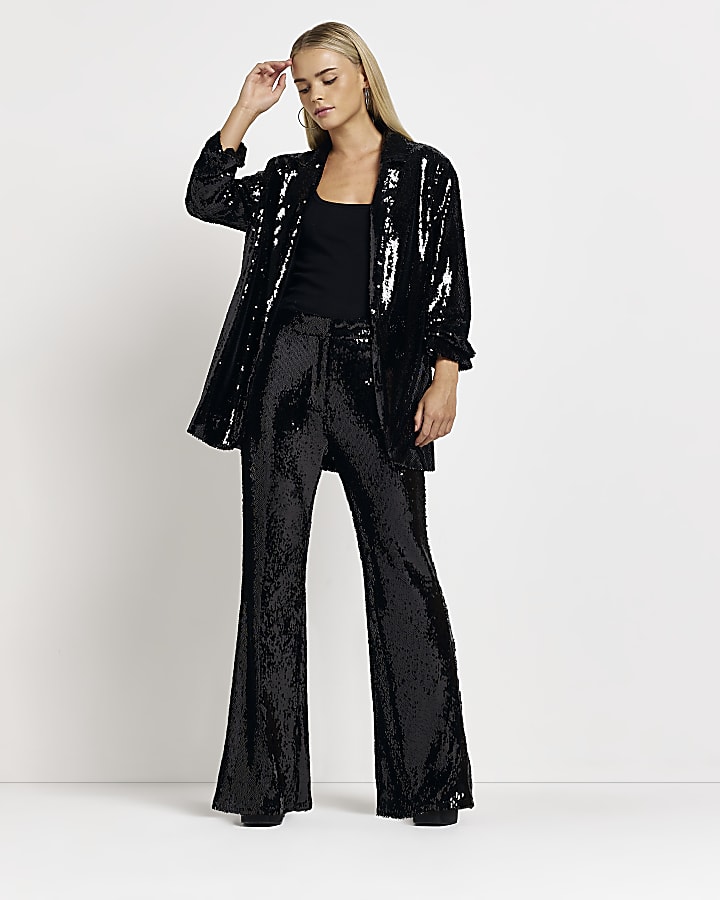Petite black sequin flared trousers