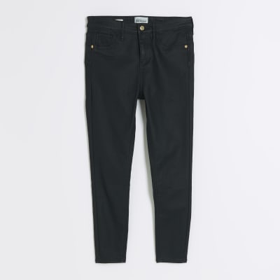 Petite black skinny fit coated jeans River Island