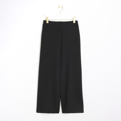 Petite black stitched wide leg trousers | River Island