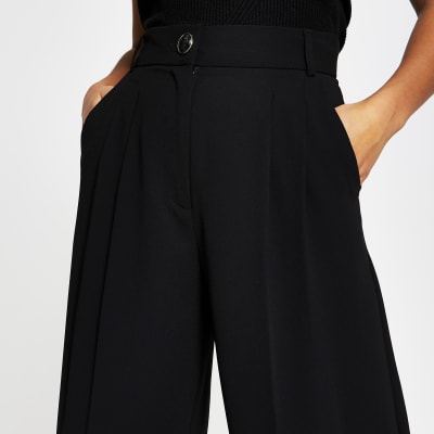 Petite black wide leg pleat front trousers