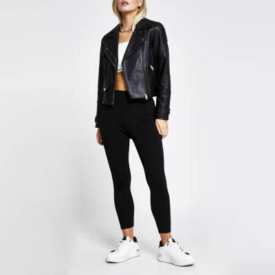 Petite black zip faux leather biker jacket