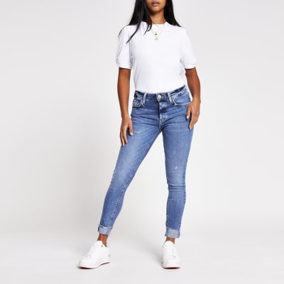 Petite blue amelie mid rise ripped jean