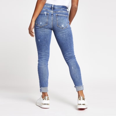 Petite blue amelie mid rise ripped jean