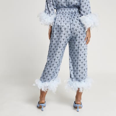 Petite blue geometric feather hem trousers