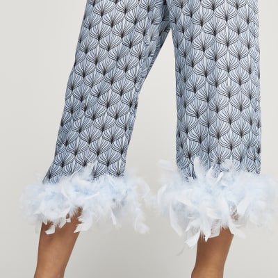 Petite blue geometric feather hem trousers