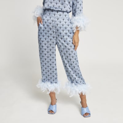 Petite blue geometric feather hem trousers
