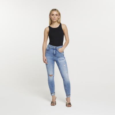 Petite blue high waist skinny ripped jeans | River Island